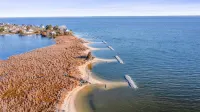 Modern Waterfront Home with Kayak, Firepit, Gameroom, Pool+Beaches, Dog & EV OK