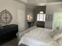 Spectacular Main Lake Sunsets from spacious 4 BR, 3800 sq ft, 1-acre point lot
