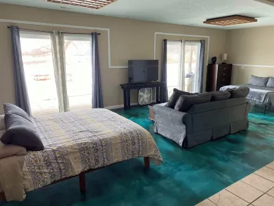 Riverfront Studio Cabin w/ Sunset View, Wi-Fi, Yard, and Fire-pit!