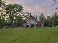 One of a kind location on  Mullett Lake & Cheboygan River Hotels in Cheboygan County