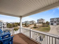 Second row, easy beach access, views and a pool
