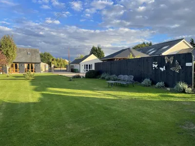 Quiet setting with secure gated parking, children's play area & farm animals