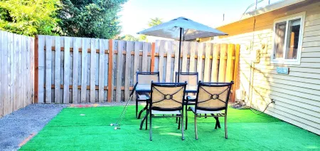 Duplex with Backyard and Putting Green