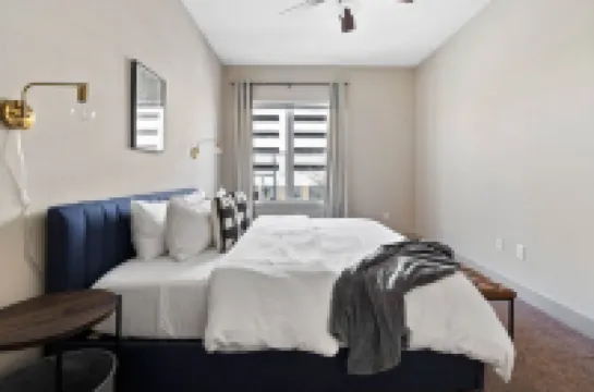 Stylish Open-Air Balcony and Modern Amenities - Chic Urban Haven Hotels in 