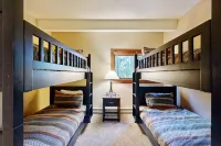 Designer Forest-View Condo with Balcony, Wood Stove & Sunroom - Near Slopes