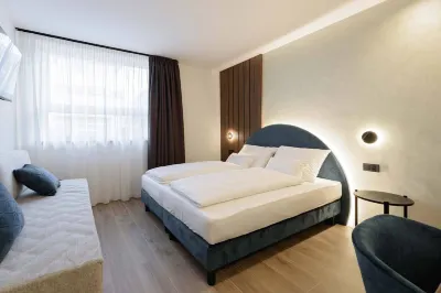 NAOMI Rooms Hotel dekat Cantina Rotari