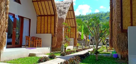 Bale Lumbung Bungalows Отели рядом с достопримечательностью «Нуса-Ченинган»