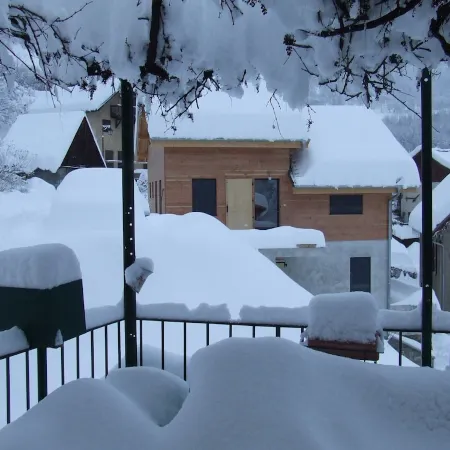 Lovely village house with a view of lake and mountain VAUJANY on the other side Alpe d'Huez