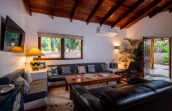 Spacious 3-Bedroom Villa. with a pool, rancho- STEPS away from Langosta Beach.
