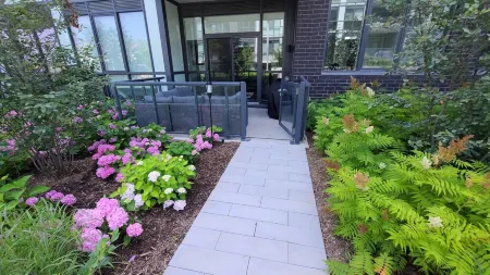 Cozy Lake Simcoe 2 bedroom condo with a garden walkout to the boardwalk/ Pier.