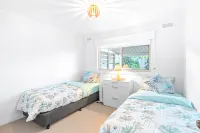 Sandy Toes and Salty Kisses