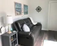 Charming shipping container home with lake view and boat ramp.
