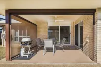 Bargara HavenWelcome to your personal oasis: Coastal calm blends with style.