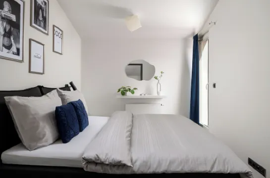 Coco Chanel Boutique Apartment by Goodnite cz