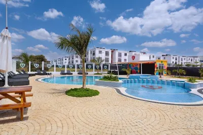 Cozy 2-bedroom apartment in Tatu City with gym, pool, & restaurant in the estate Hotels in 