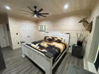 TAKE IT EASY Fishing Cabin. Large enclosed bay for storing the boat.