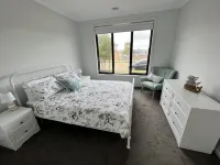 Brand new, spacious family home in walking distance to beach.