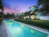 Stunning 4/3 w/ Heated Pool, Water View & Arcade! Hotels in Jensen Beach