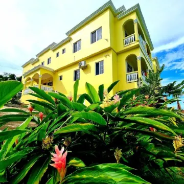 Kingsbird by the sea Inn Hoteles en Discovery Bay