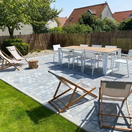 Pleasant house in quiet neighborhood with garage and fenced garden.