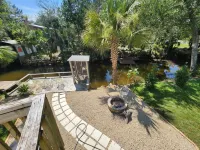 GULF ACCESS  home w/ dockage, private yard & 2 min walk to eat and stores! - 4-Star