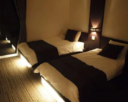 Sandal Wood Hotels in Minamitane