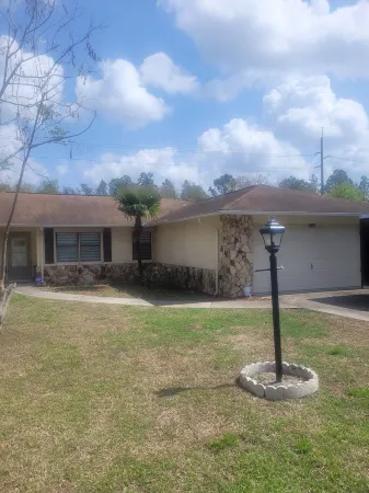 Large Bungalow with fenced yard and game room. Close to everything