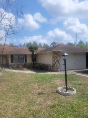 Large Bungalow with fenced yard and game room. Close to everything