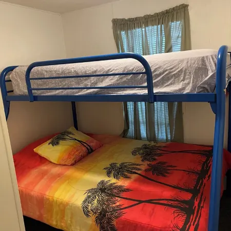 Vacation Stay at Hubbard Lake Air-Conditioned Lakefront Mobile Home