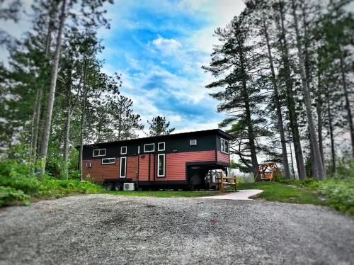Near Pictured Rocks and trails, On the Au Train River, has private hot tub