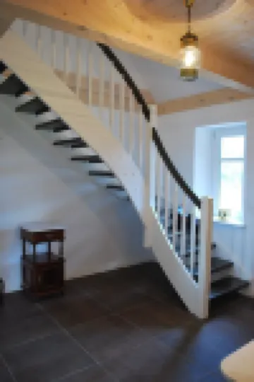 Cottage on park-like grounds with pond