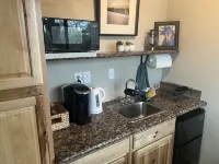 A cute and functional space located on beautiful 2.5 acres