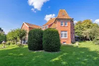 Kornboden vacation apartment in the Pilsumer Hof with a fantastic garden