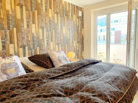 Modern vacation apartment directly on the North Sea dike