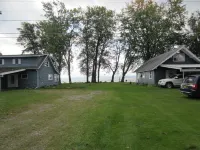 Enjoy a 4-bedroom vacation home with 75 feet of lake frontage on Chautauqua Lake