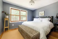 Updated Leelanau home nestled bt Suttons Bay & West Bay, 3 min walk to 2 beaches