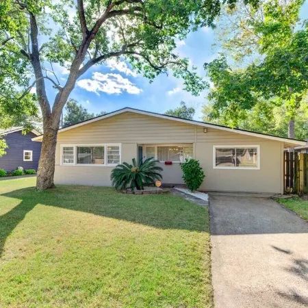 King bed with Pool table, decked patio and, gym.