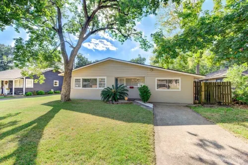 King bed with Pool table, decked patio and, gym.