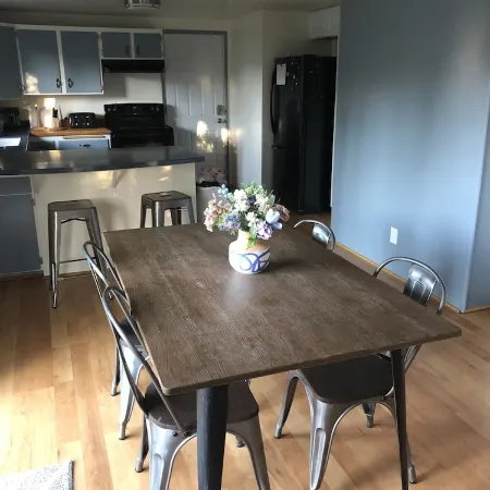 Cozy home next to airport with fenced backyard and lots of sun!