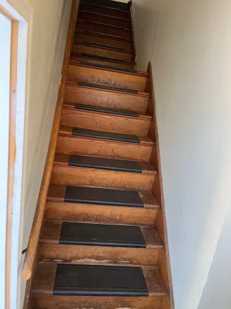 Romantic Second floor walk up Studio suite in central Marquette w sauna access