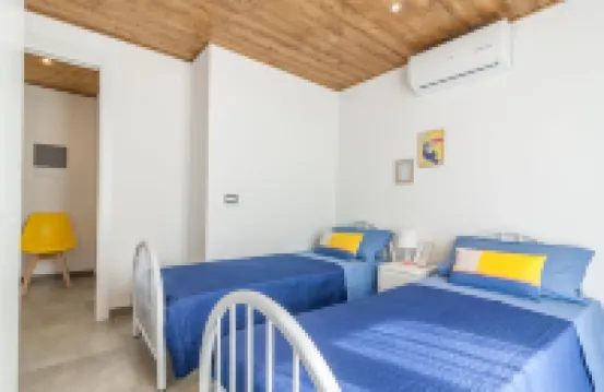 Detached villa with outdoor hot tub, swimming pool and lawn