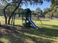 Guest house nestled amongst 100 year old oaks with fun farm animals!