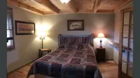 A hand-crafted cabin built in the middle of a Christmas Tree farm.