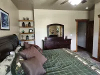 REMOTE CABIN WITH HOT TUB, MOVIE THEATER AND HUGE COVERED DECK WITH FIRE TABLE