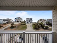 Second row, easy beach access, views and a pool