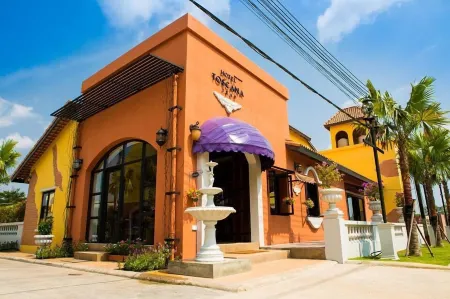 Hotel Toscana Trat Отели рядом с достопримечательностью «Wat Buppharam or Wat Plai Klong»