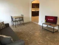 Spacious and Bright 2 Bedroom Apartment with 1 Bathroom and Private Street Entrance Hotels near Roberto Clemente Park