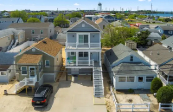 Luxury Coastal Home • Badges • Parking •