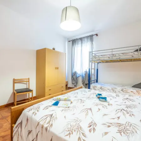 Large seaside apartment with patio in Lu Bagnu