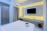 Nice And Cozy Studio At Amartha View Apartment